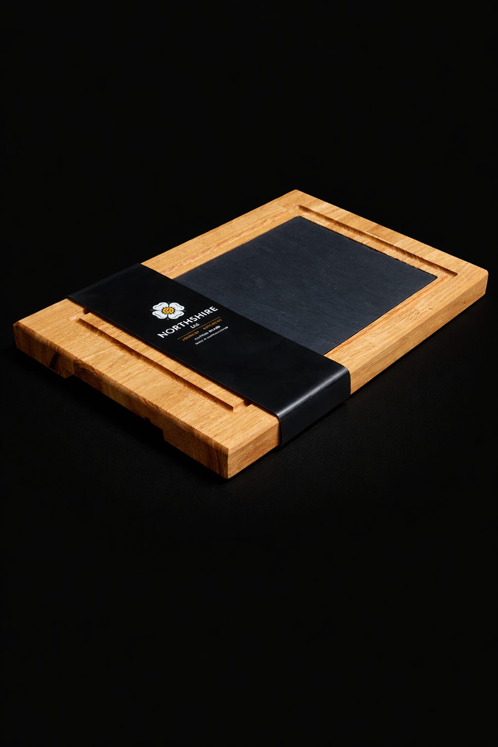 Northshire oak and slate serving board with branded sleeve