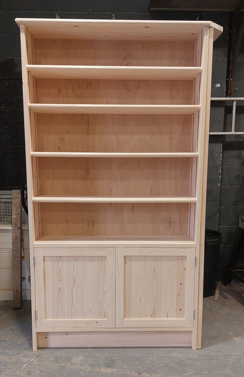 Solid pine cabinet with shelves and lower doors